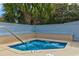 Private hot tub offers a tranquil retreat surrounded by lush landscaping and fencing at 647 Norris Dr., Pawleys Island, SC 29585