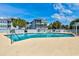 Relaxing community pool area with comfortable seating and lush landscaping at 647 Norris Dr., Pawleys Island, SC 29585