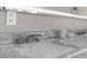 Close-up of the bathroom featuring marble countertop and a waterfall faucet at 904 62Nd Ave. N # A, Myrtle Beach, SC 29572