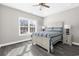 This primary bedroom boasts ample natural light, hardwood floors, and a spacious layout at 904 62Nd Ave. N # A, Myrtle Beach, SC 29572