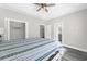 Primary bedroom featuring tray ceiling, walk in closet and ensuite bathroom at 904 62Nd Ave. N # A, Myrtle Beach, SC 29572
