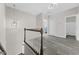 Upstairs landing hallway, featuring modern flooring and access to bedrooms and bathrooms at 904 62Nd Ave. N # A, Myrtle Beach, SC 29572