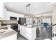 This spacious kitchen has an island that provides extra counter space, open to the living room with modern appliances at 904 62Nd Ave. N # A, Myrtle Beach, SC 29572