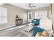 Bright living room boasts modern finishes, hardwood floors, a stylish decor and plenty of natural light at 904 62Nd Ave. N # A, Myrtle Beach, SC 29572