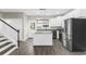 Contemporary kitchen with a central island, stainless steel appliances, and sleek countertops at 904 62Nd Ave. N # E, Myrtle Beach, SC 29572