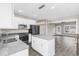 Modern kitchen featuring an island with granite countertops and stainless steel appliances at 904 62Nd Ave. N # E, Myrtle Beach, SC 29572