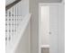 View of stairway and doorway to a bedroom or closet with hardwood floors at 904 62Nd Ave. N # E, Myrtle Beach, SC 29572