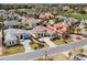 Aerial view of a lovely home with a tile roof, a pristine lawn, and attractive landscaping at 9109 Sanremo Ln., Myrtle Beach, SC 29579
