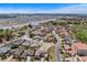 Gorgeous aerial view of a house surrounded by lush greenery, waterways and a neighborhood at 9109 Sanremo Ln., Myrtle Beach, SC 29579
