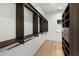 Spacious walk-in closet with custom shelving and wood floors, offering ample storage space at 9109 Sanremo Ln., Myrtle Beach, SC 29579