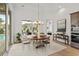 Elegant dining room with views of the pool and backyard at 9109 Sanremo Ln., Myrtle Beach, SC 29579