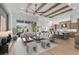 This expansive living room with high ceilings connects seamlessly to the kitchen and outdoor living spaces at 9109 Sanremo Ln., Myrtle Beach, SC 29579