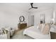 Serene main bedroom with neutral tones, ample natural light, and cozy sitting area at 9109 Sanremo Ln., Myrtle Beach, SC 29579