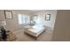 This is a simple bedroom with a bed, window, and decor at 1100 Commons Blvd. # 606, Myrtle Beach, SC 29572