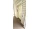 Interior elevator of a condo building featuring beige siding, and the elevator entrance at 1100 Commons Blvd. # 606, Myrtle Beach, SC 29572