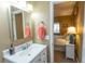 Bathroom with vanity and access to bedroom at 1221 Tidewater Dr. # 1922, North Myrtle Beach, SC 29582