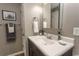 Well-maintained bathroom with modern sink, mirror, and towel rack at 1221 Tidewater Dr. # 1922, North Myrtle Beach, SC 29582