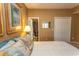 Bedroom with a closet and a bathroom access at 1221 Tidewater Dr. # 1922, North Myrtle Beach, SC 29582