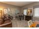 Bedroom with neutral walls, drumset, and ample natural light, offering a versatile and comfortable space at 1221 Tidewater Dr. # 1922, North Myrtle Beach, SC 29582