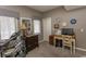 Bedroom with neutral walls, desk, and drumset, providing a functional and cozy space at 1221 Tidewater Dr. # 1922, North Myrtle Beach, SC 29582