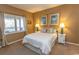 Cozy bedroom featuring a large window and beach-themed decor at 1221 Tidewater Dr. # 1922, North Myrtle Beach, SC 29582
