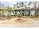 Two-story condo featuring a charming facade, well-maintained landscaping and inviting outdoor spaces at 1221 Tidewater Dr. # 1922, North Myrtle Beach, SC 29582