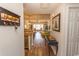 Inviting hallway with hardwood floors, decorative accents, and seamless transition into the living area at 1221 Tidewater Dr. # 1922, North Myrtle Beach, SC 29582
