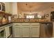 Open concept kitchen featuring stainless steel appliances, wood countertops, and a seamless connection to the living area at 1221 Tidewater Dr. # 1922, North Myrtle Beach, SC 29582