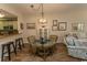 Inviting living area with glass top table and hardwood flooring at 1221 Tidewater Dr. # 1922, North Myrtle Beach, SC 29582