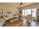 Cozy living room features hardwood floors and well-lit seating area at 1221 Tidewater Dr. # 1922, North Myrtle Beach, SC 29582