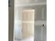 A view down the hallway with installed drywall and an open doorway at 1274 Pinetucky Dr., Galivants Ferry, SC 29544