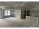 An open living area has vaulted ceilings, windows, drywall, and open access to the rest of the house at 1274 Pinetucky Dr., Galivants Ferry, SC 29544