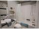 Bathroom with a vanity, toilet, and a tub with a shower with neutral tones at 1525 Capella Ln., Myrtle Beach, SC 29575