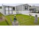 Well-manicured front yard featuring a storage shed, bird bath, and charming decorative touches for a welcoming appeal at 1525 Capella Ln., Myrtle Beach, SC 29575
