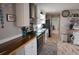 Modern kitchen features stainless steel appliances, white cabinets, and wood countertops at 1525 Capella Ln., Myrtle Beach, SC 29575