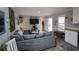 Cozy open-concept living room with a comfortable seating area and plenty of natural light at 1525 Capella Ln., Myrtle Beach, SC 29575