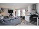 Bright living room with modern decor, seamlessly connecting to the kitchen area at 1525 Capella Ln., Myrtle Beach, SC 29575