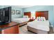 Comfortable bedroom with two beds, stylish décor, and modern amenities at 201 S Ocean Blvd. # 1812, Myrtle Beach, SC 29577