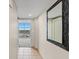 Hallway featuring tile floors and a view of the city at 201 S Ocean Blvd. # 1812, Myrtle Beach, SC 29577
