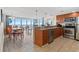 Bright kitchen with stainless steel appliances, granite countertops, and an ocean view at 201 S Ocean Blvd. # 1812, Myrtle Beach, SC 29577