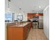 Modern kitchen with granite counters, stainless steel appliances, and ample cabinet space at 201 S Ocean Blvd. # 1812, Myrtle Beach, SC 29577