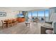 Inviting condo living room features beach views, dining area, and a comfortable seating area for relaxation and entertainment at 201 S Ocean Blvd. # 1812, Myrtle Beach, SC 29577