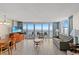 Bright condo living room with ocean views, stylish furnishings, and access to a private balcony for ultimate relaxation at 201 S Ocean Blvd. # 1812, Myrtle Beach, SC 29577