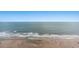 Serene ocean view from the condo showcasing the beach and its tranquil atmosphere with the waves hitting the sand at 201 S Ocean Blvd. # 1812, Myrtle Beach, SC 29577
