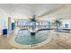 Indoor pool area featuring lounge chairs at 201 S Ocean Blvd. # 1812, Myrtle Beach, SC 29577