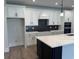 Modern kitchen features stainless steel appliances, white cabinets, and a kitchen island at 242 River Edge Dr., Myrtle Beach, SC 29588