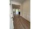 Bright living room with hard wood floors and ample natural light from a glass door at 242 River Edge Dr., Myrtle Beach, SC 29588