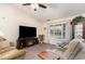 Comfortable living room with plush seating, a fireplace, and a large window at 550 Crusade Circle, Conway, SC 29526