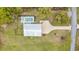Aerial view of the backyard pool and garden area along with the home's access to a long driveway at 67 Kingsbury Pl., Georgetown, SC 29440