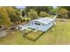Aerial view showing the home's backyard area, featuring a pool, garden area, and plenty of backyard space at 67 Kingsbury Pl., Georgetown, SC 29440